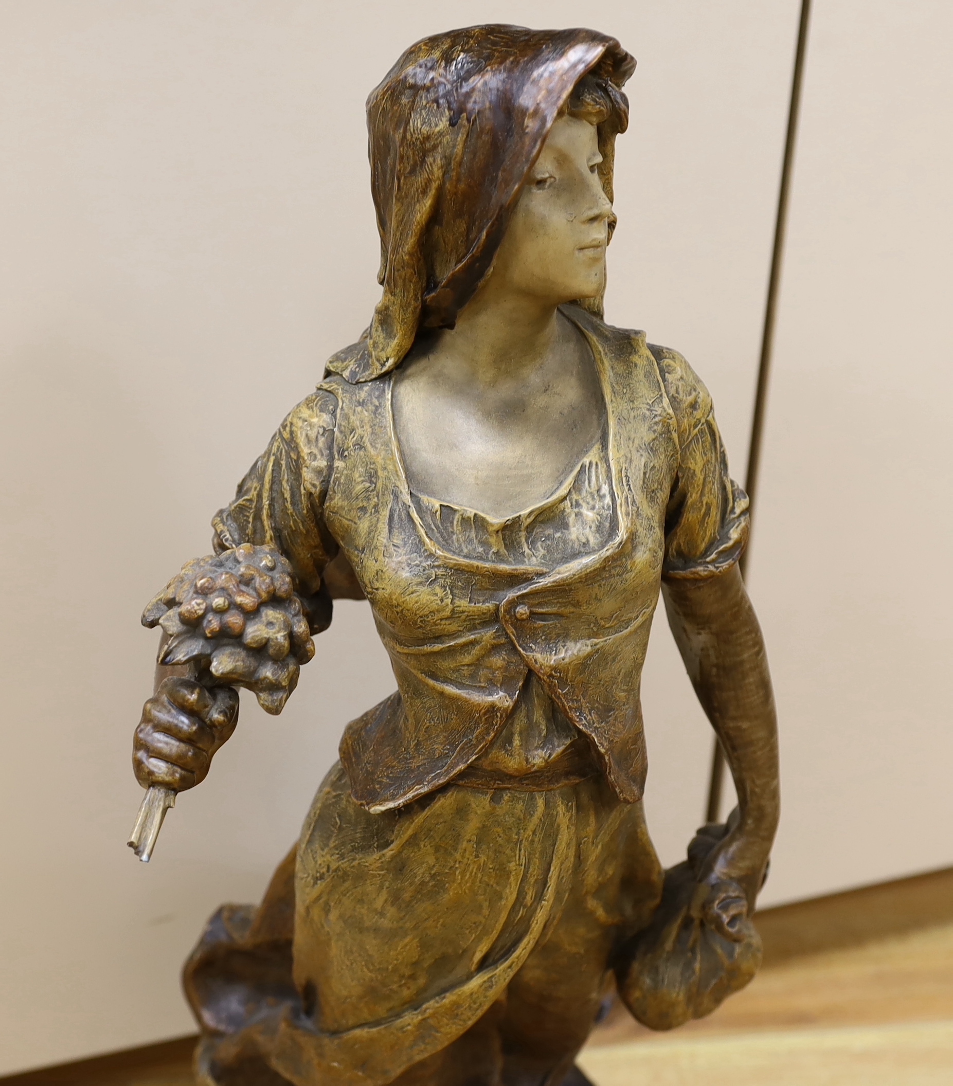 A Van Hasselt earthenware figure, signed by artist to base, 73cm